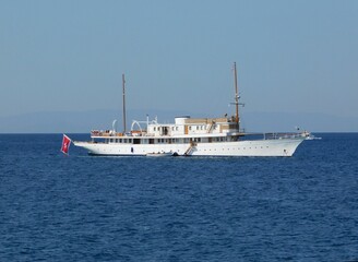 An old luxury yacht off the coast of Glyfada in Attica, Greece