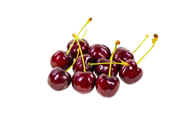 Crimson cherries piled on a white background. Clipping path.