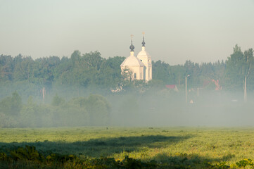Morning view of the church in the fog