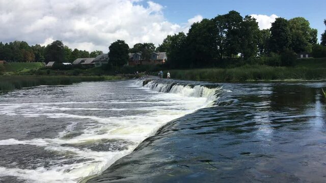 European waterfall on the Venta river, Latvia. Power of nature. High quality 4k footage