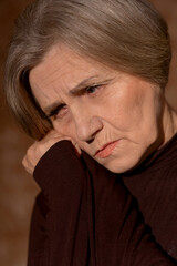 Close up portrait of sad senior woman