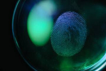 Beautiful abstract blue, green colored  fingerprint on background texture for design. Macro...