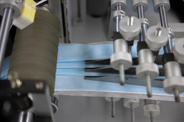The medical face mask production machine. 