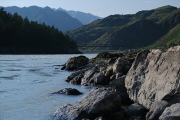 Fototapeta premium The Katun River, Altai. Mountain river flowing among the mountains. Sunny day.