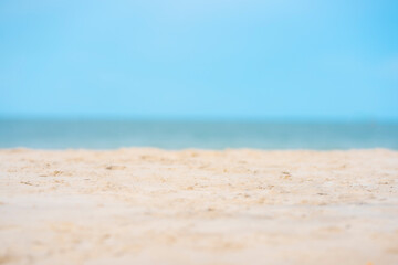 Fototapeta na wymiar Beautiful white tropical sand beach and blue clear summer sky
