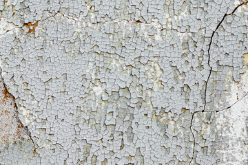 Obraz premium Texture of a concrete wall with cracks and scratches which can be used as a background