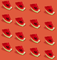 Identical pieces of cut ripe watermelon on a red background collage