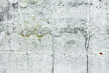 Texture of a concrete wall with cracks and scratches which can be used as a background