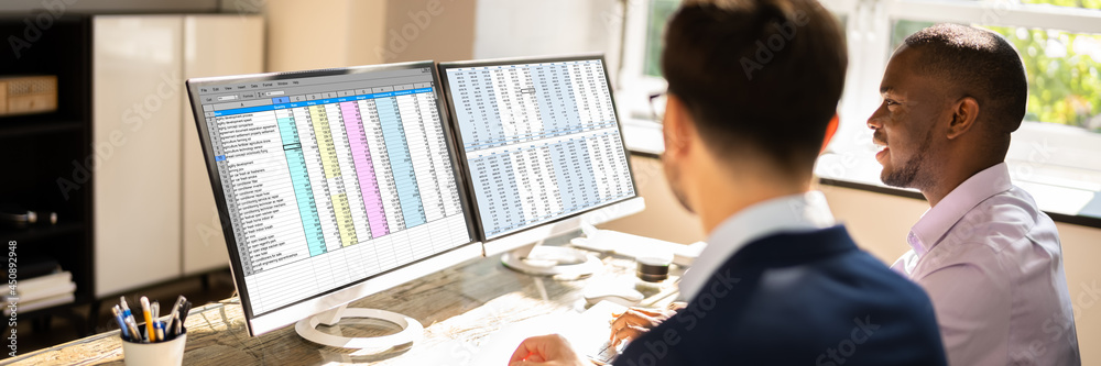 Poster Spreadsheet Data On Computer Monitor