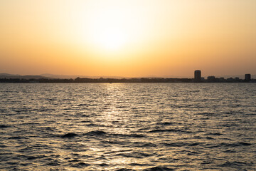 Fototapeta na wymiar Romantic Beach Sunset. Sea Water