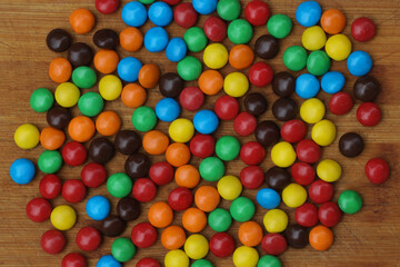 Fototapeta na wymiar Colorful tasty chocolate candies. Colored sweets.