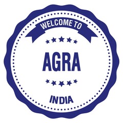 WELCOME TO AGRA - INDIA, words written on blue stamp