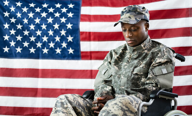Patriotic Soldier Sitting In Wheel Chair