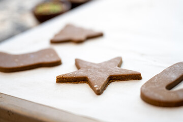 Holiday Cutout Cookies on Parchment Paper