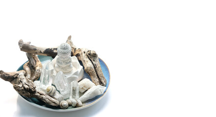 Cute Buddha figurine and minerals isolated on white background. Magic gemstones crystals for healing esoteric spiritual practice, relaxation and meditation. life balance. Home decor in interior