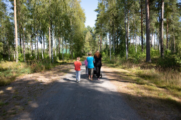 Fototapeta premium family walking in the country