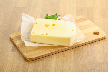 Maasdam cheese over the board