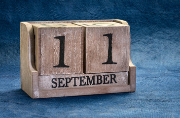 September 11 date in a rustic wood block calendar, reminder of terrorism attack