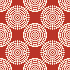 Seamless modern pattern with creative spheres made up of small circles. Print for fashion fabrics, decorative pillows, wrapping paper. Brown and pastel pink. Vector.