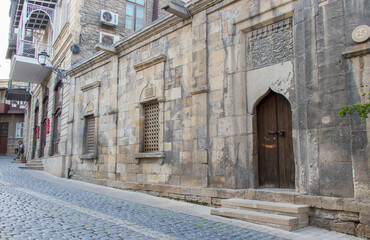 Fototapeta na wymiar Medieval buildingns in Azerbaijan. Sheikh Ibrahim Mosque in Icherisheher - Baku