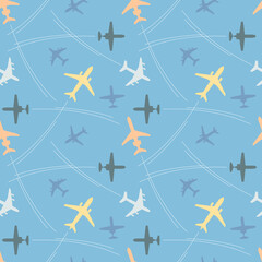 seamless pattern with multicolored passenger airplanes and flight paths