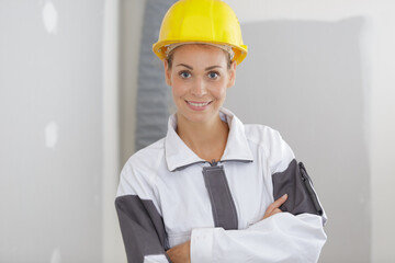 woman builder engineer standing indoors