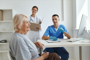 Obraz na płótnie Canvas patient at the hospital at the doctor's appointment nurse assistant diagnostics