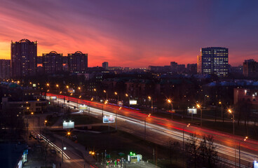 Fototapeta na wymiar A Moscow avenue at sunset