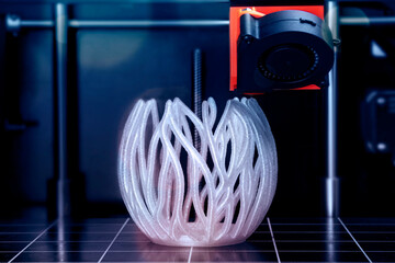Printing a vase on a 3D printer from white plastic	