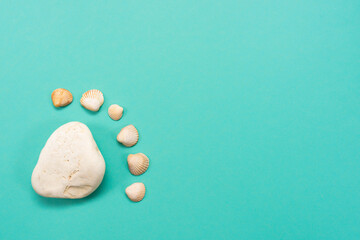White stones on a blue background. Free space for your text