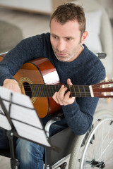 Obraz premium positive handicapped man proud of his hobby