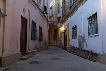 Houses and narrow streets of the old city of Baku. Evening time in the old town of Icherisheher