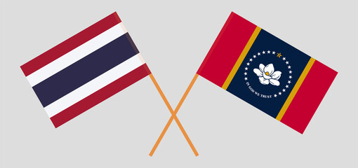 Crossed flags of Thailand and the State of Mississippi. Official colors. Correct proportion