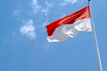 Naklejka na ściany i meble indonesian flag on the wind