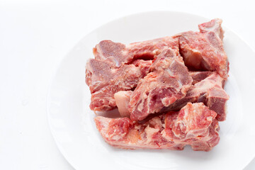 Raw pork bone isolated on white background.