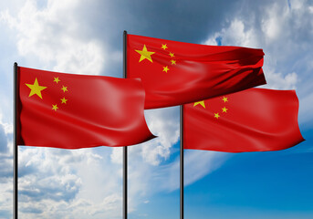 Flags of China on sky background. Flags of People's Republic of China flutter in wind. Three flagpoles with PRC banners. Symbols of People's Republic of China. Chinese flags in front of clouds