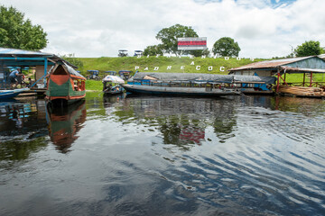 Obraz premium PADRE COCHA, Peru View of river port in village Padre Cocha near Iquitos, Peru.