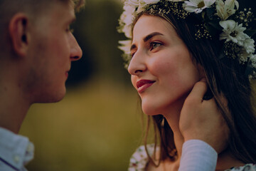 portrait photo of a young couple at sunset. a couple in love together