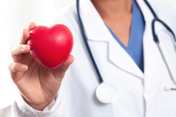 Doctor doing a heart examination, health care concept about heart disease and treatment.