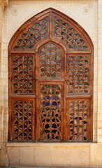 Intricate islamic wood crafted door design, Islamic design carved on wooden door.