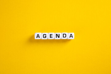 Agenda word on yellow background