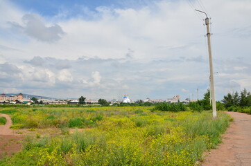 A lawn on town panorama