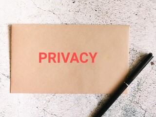 Privacy written on envelope with a pen.