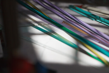 Fragment of a glass-blowing workshop. Colored glass sticks.