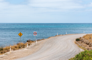 Gravel Coastal Road with Warning Signs - 30kph speed limit and pedestrian warning - Victor Harbor,...