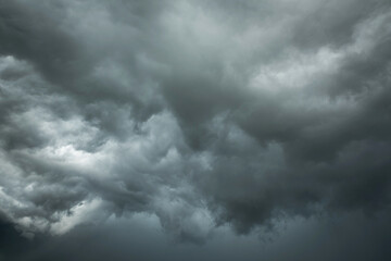 Dramatic storm clouds in rainy season, Black and dark sky with clouds