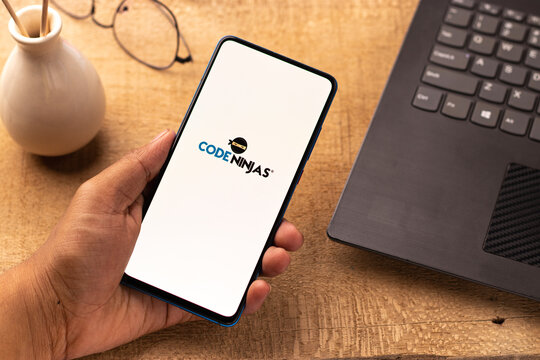 Assam, india - April 19, 2021 : Code Ninjas logo on phone screen stock image.