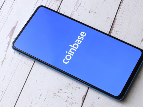 Assam, india - March 10, 2021 : Coinbase logo on phone screen stock image.