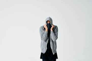 masked man with hood anonymity theft hacking