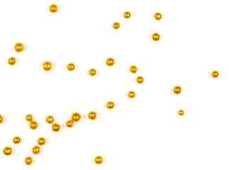 Small balls of gold on a white background.